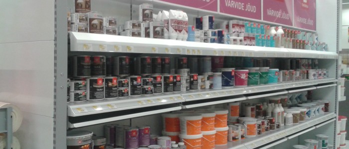 paint department wall shelving with price labels