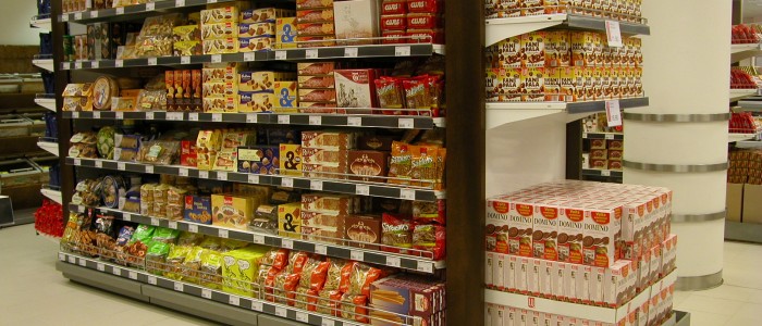 grocery wall shelving with price label holders