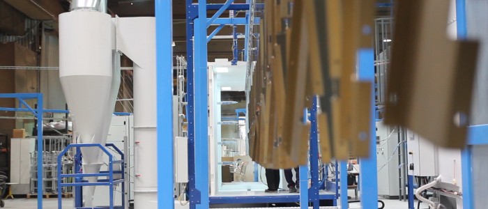 Powder coating line with metal parts